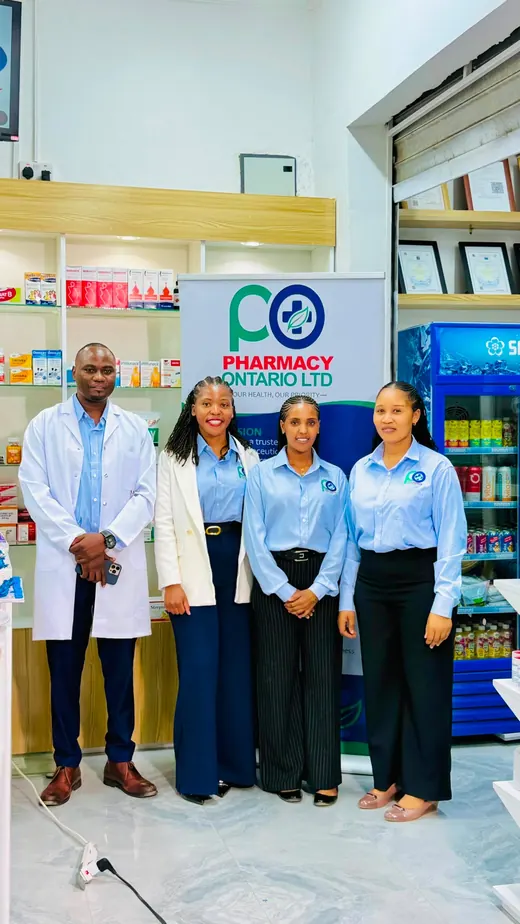 Four members of the Pharmacy Ontario team standing by the shelves